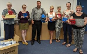 FCC team unpack donated Madlug bags at Malvern Office